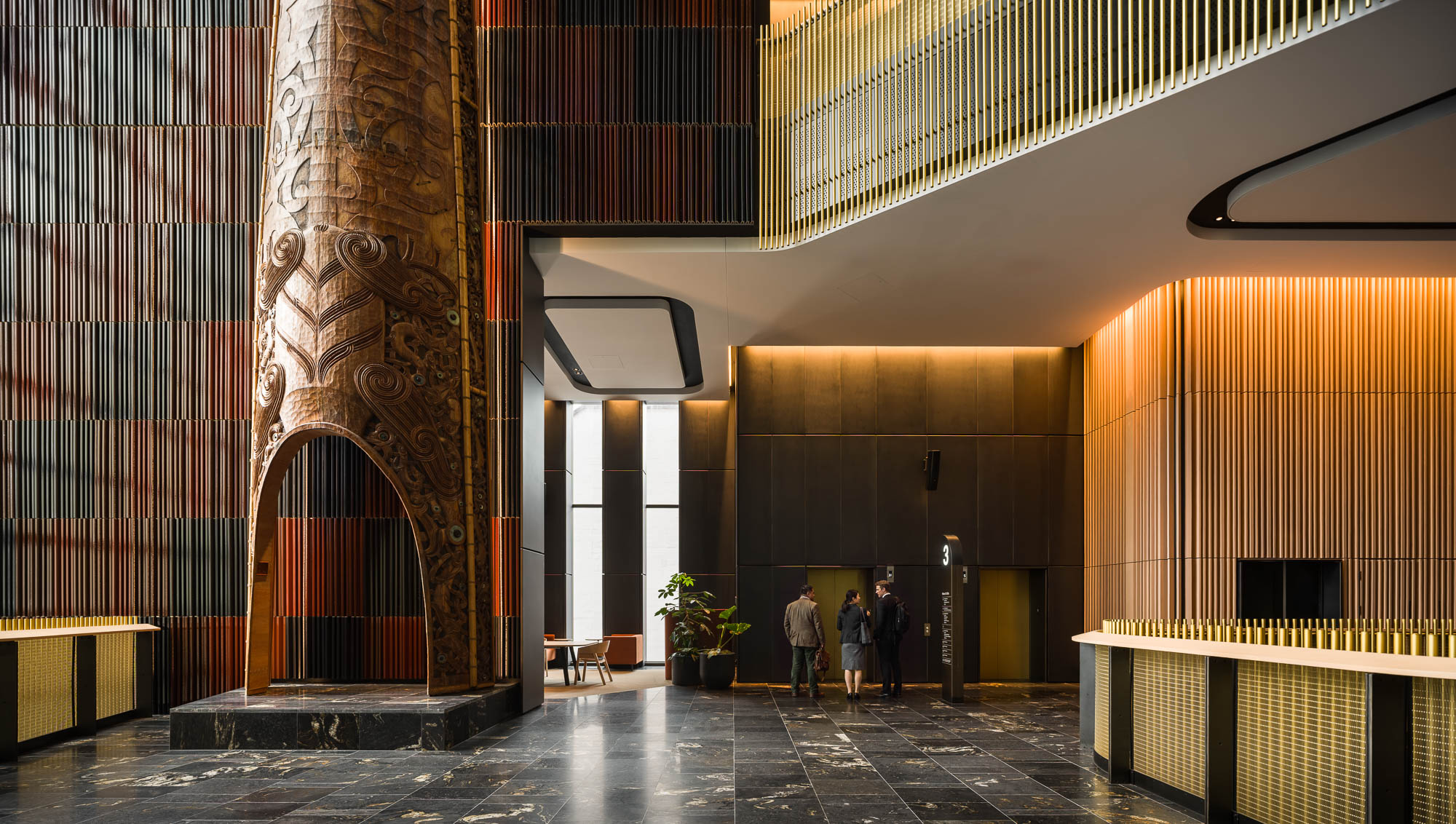 Hotel lobby interior with warm timber and ambient lighting